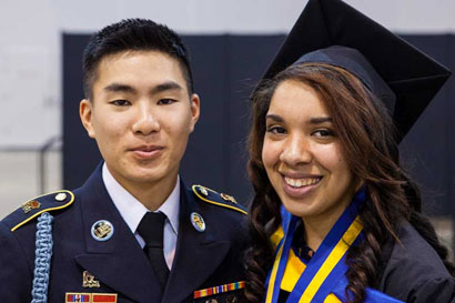 Two JWU students in military uniforms