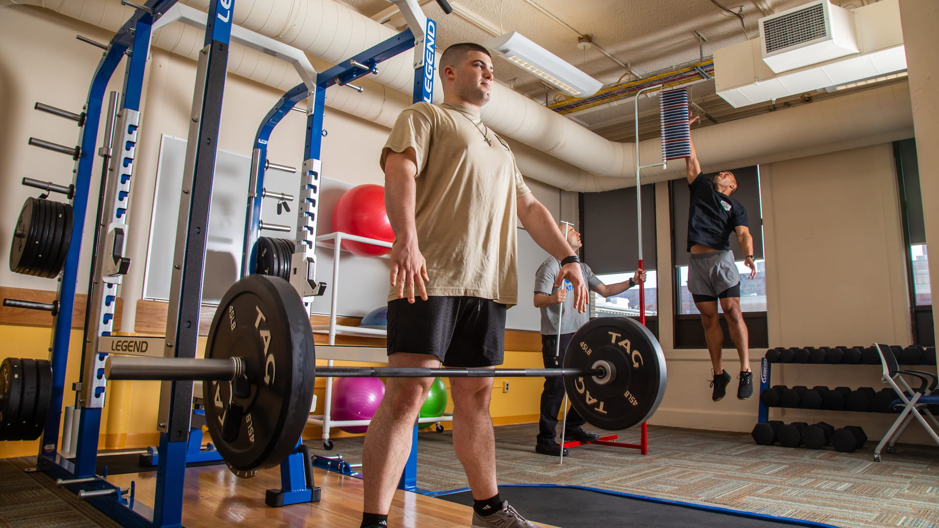 work with students to test equipment in JWU Providence’s new Exercise Sports Science lab.