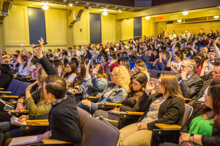 JWU students make up the audience for the investment forum in Xavier Auditorium.