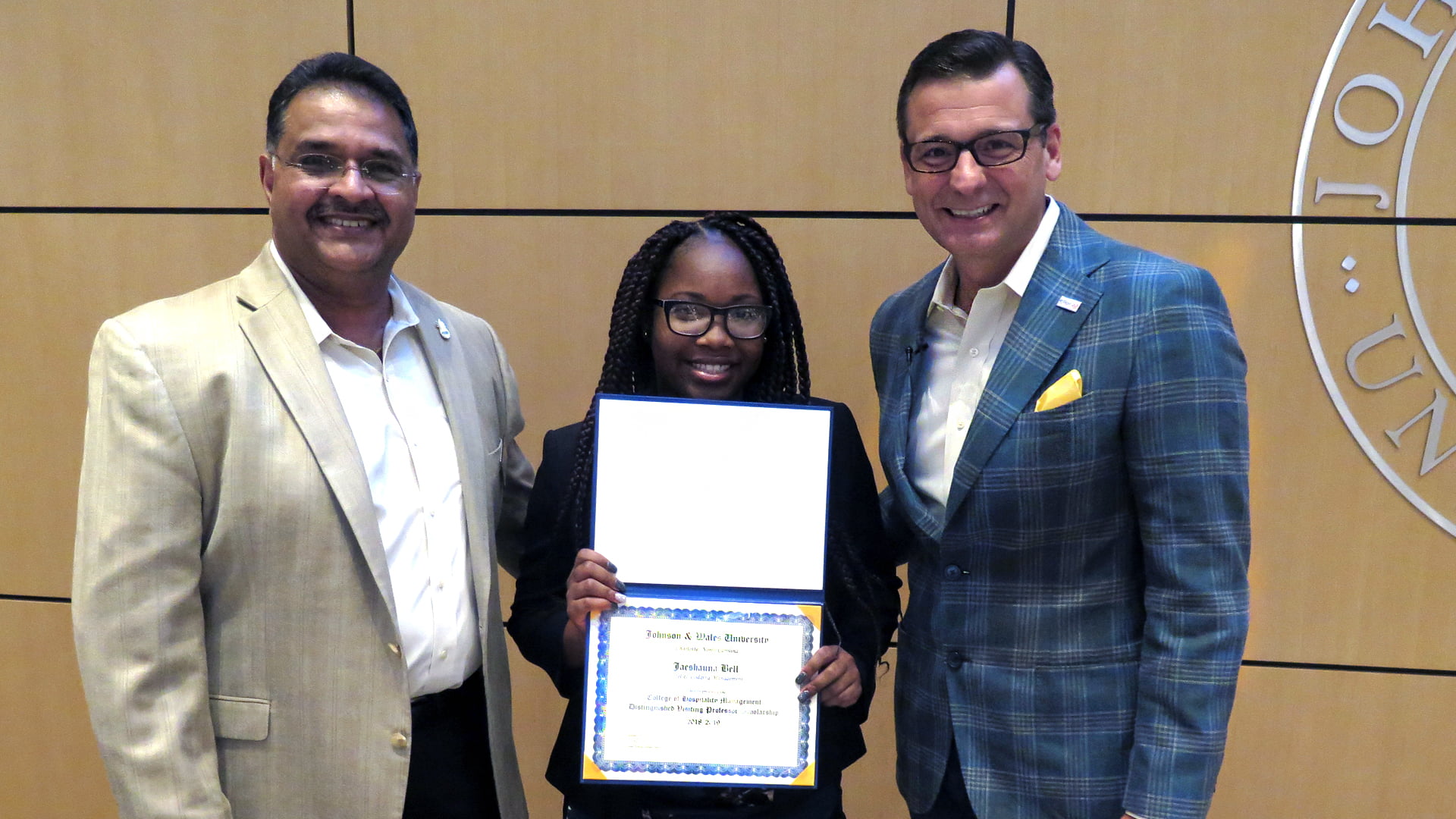 Hospitality Chair Sunil Atreya, DVP Scholarship Recipient Jaeshauna Bell, and Poplin.