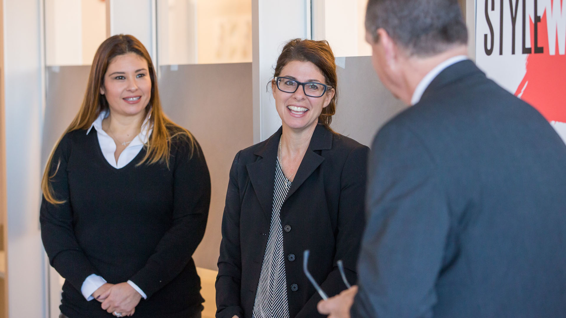 Rosanna Ortiz, Deana Marzocchi, associate professor and department chair, and Dean Frank Tweedie.