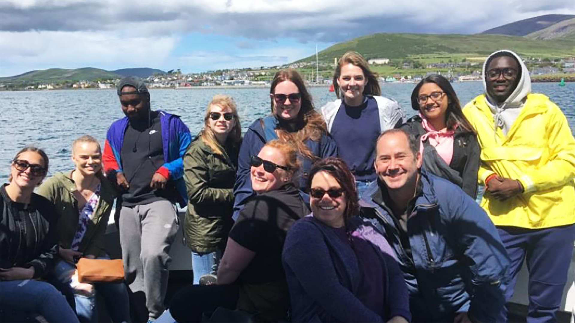 a group of students on a boat in Ireland