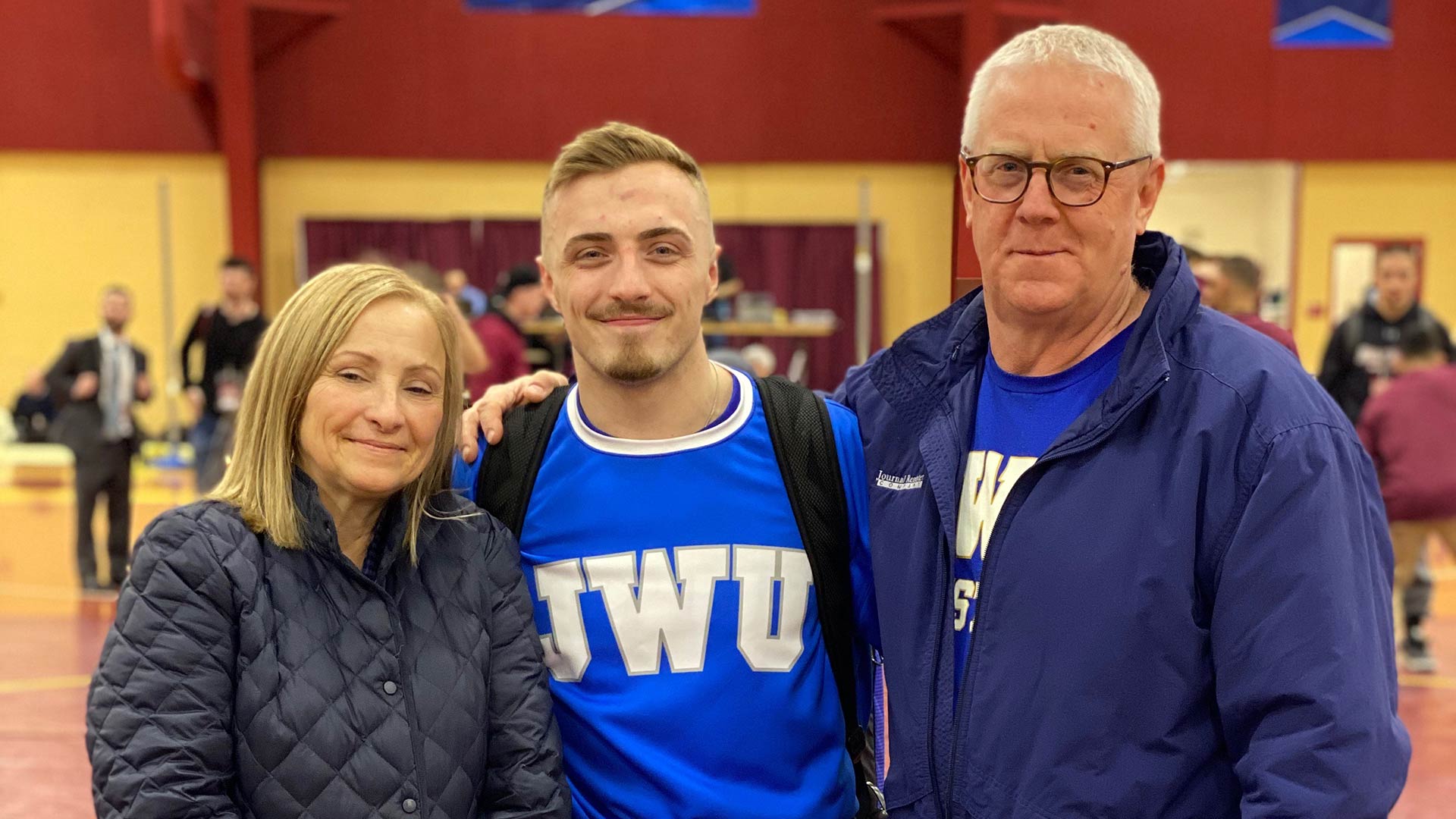 Higginson with his parents, who he cites as his heroes