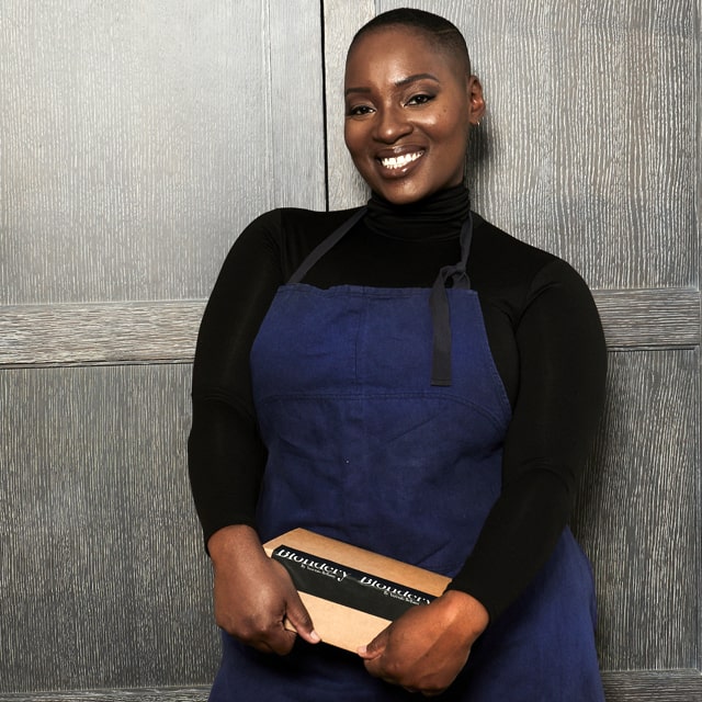 Baker Auzerais Bellamy '12 in her kitchen.