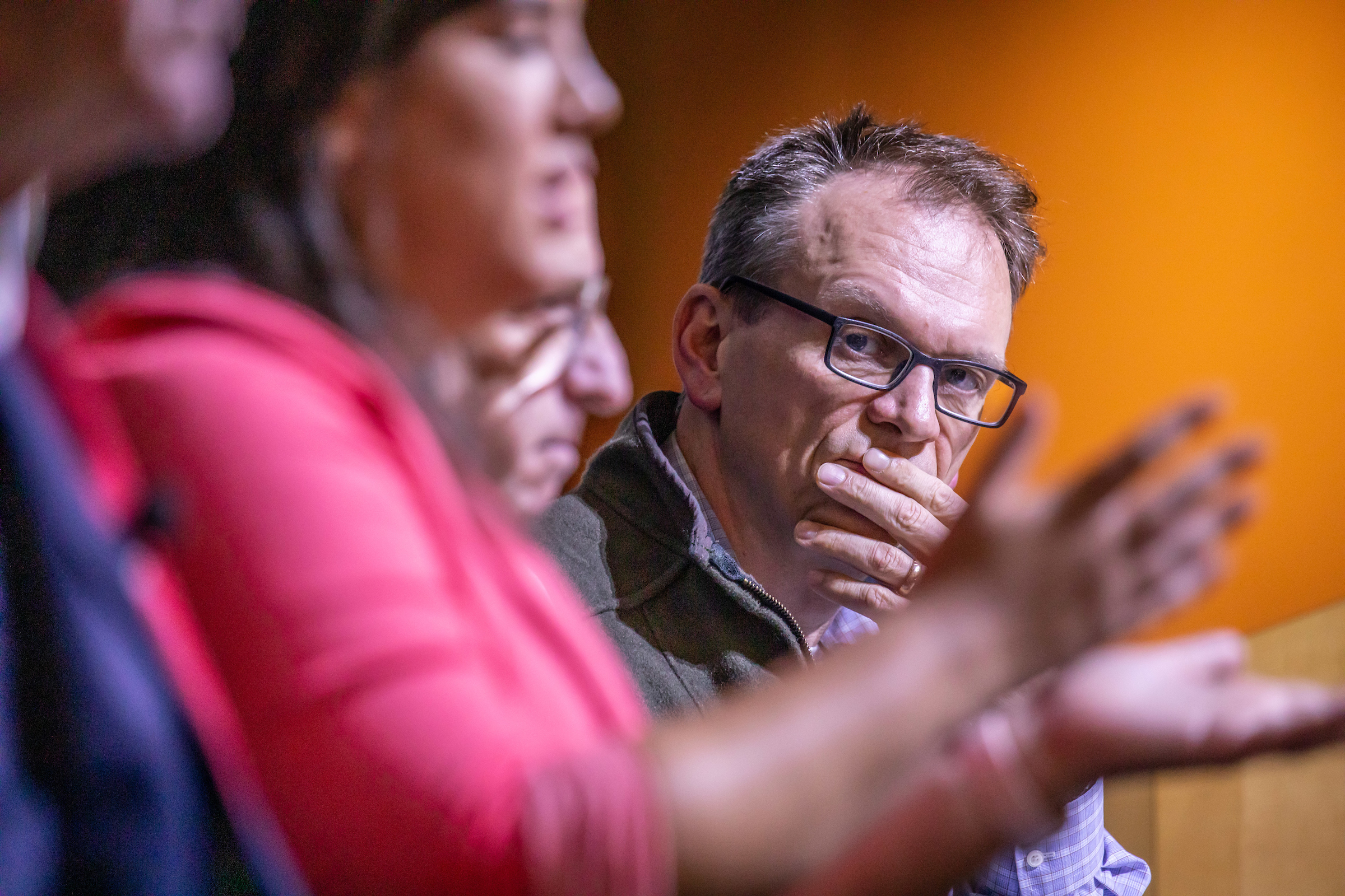 JWU Professor Magnus Thorsson listens as investigate reporter Steph Machado speaks about cannabis legalization