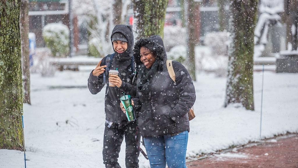 Winter scene with students walking