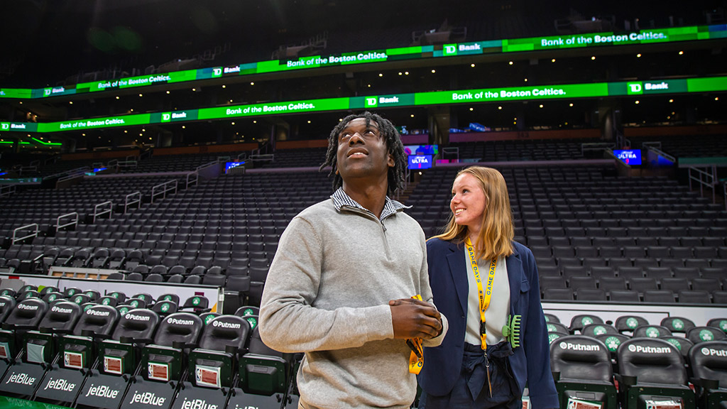 Students on the court at TD Garden