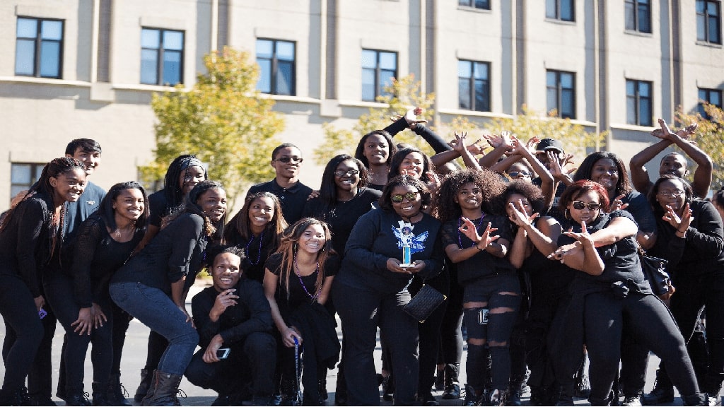 a group of students taking a picture 