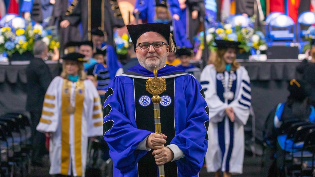 Provost Rich Wiscott, Ph.D. in  his graduate regalia.