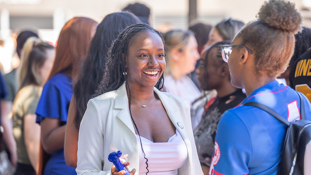 A student smiling