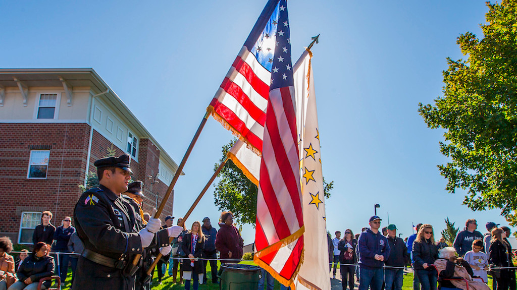 Police officers holding flags