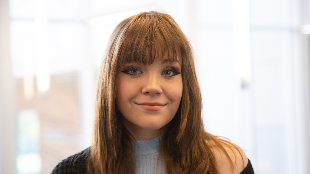 A woman smiling