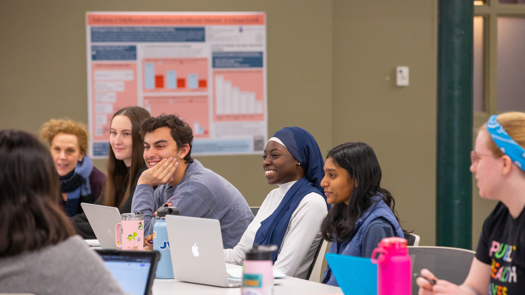 URC fellows meet in the Undergraduate Research Center with Professor Jennifer E. Swanberg, Ph.D. MMHS, OTR/L.