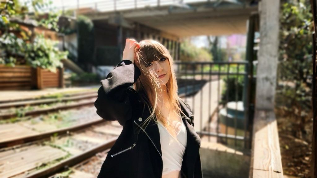 photo of Ariana Adolph '28 posing while outdoors