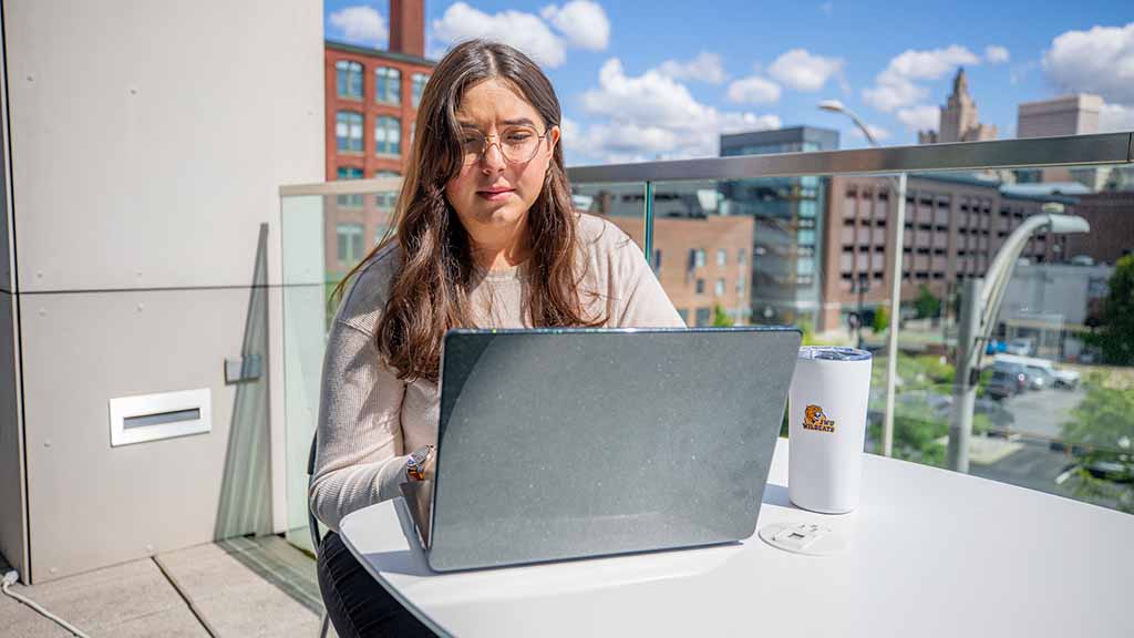 Online student studying on her laptop.