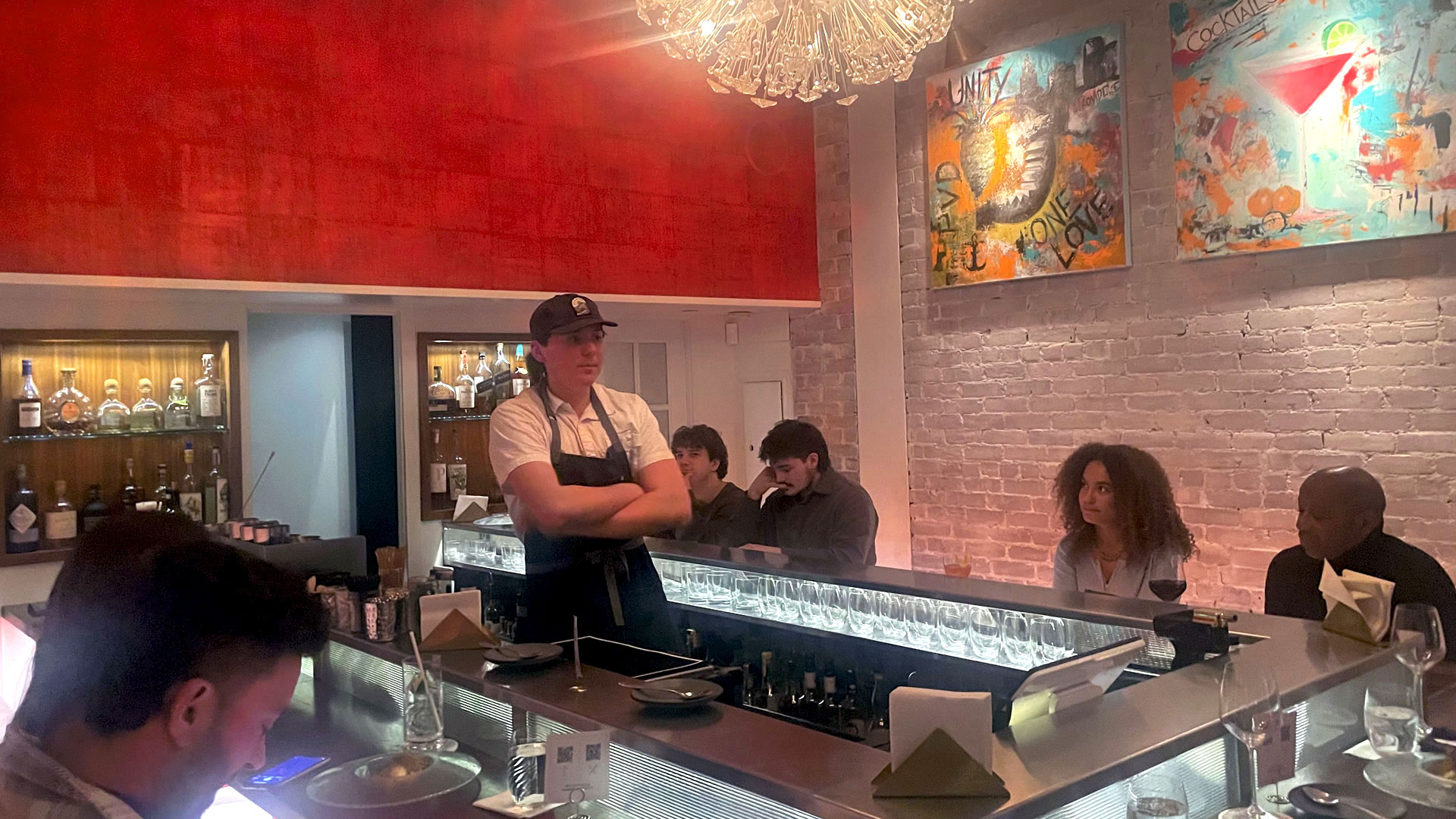 Students oversee a pop-up dinner at Clementine Bar in Providence.