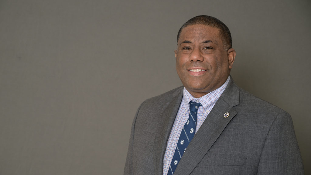 photo of Bryan Hull wearing a suit and tie