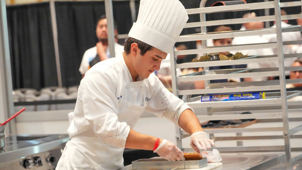 JWU Charlotte baking & pastry student Max Astacio during ACF competition.
