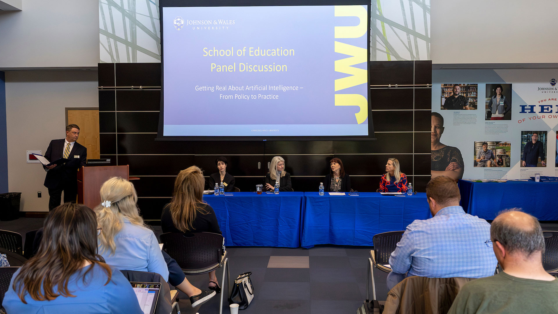 Victor Mercurio introducing the School of Education AI panelists. 