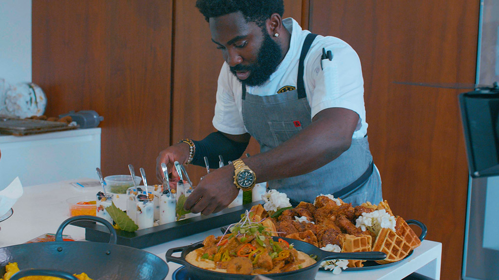 Nol Foretia '16 prepares and plates multiple types of food