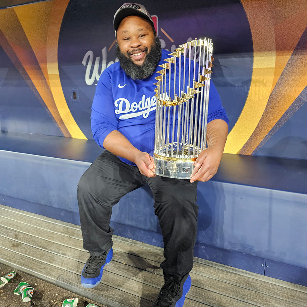 Tyrone Hall with the World Series trophy
