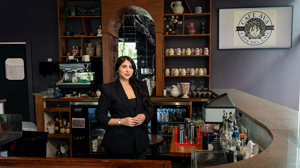 Andrea Cabrera '16, '18 MBA behind the bar at Cafe Ava