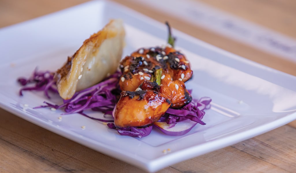 Dumpling, slaw, and yakitori with kelp.