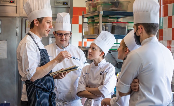 Branden Lewis and students planning a kelp-based menu.