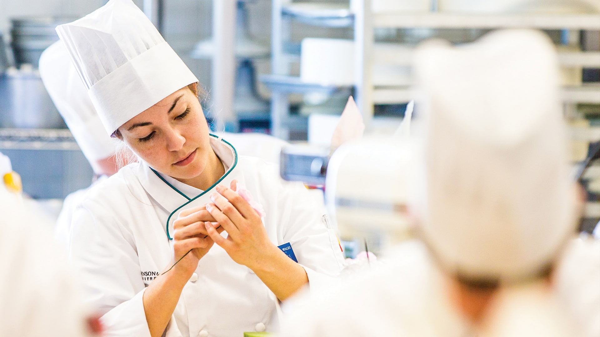 Student at work in a culinary classroom.