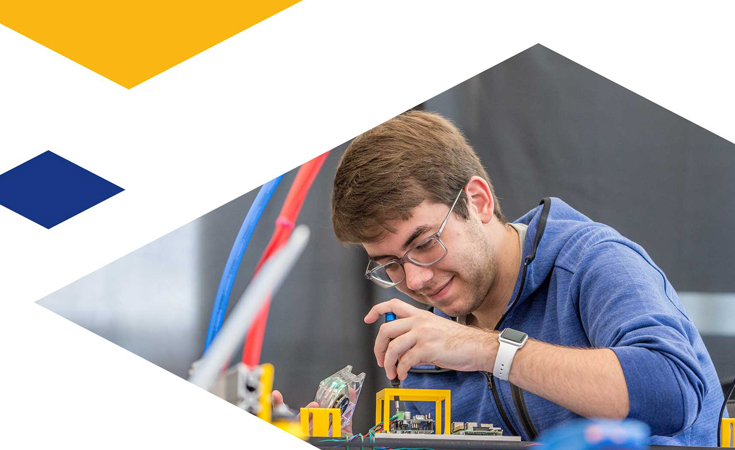 Engineering student works on a robotics project.